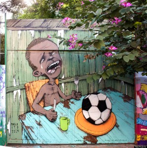 A mural by Brazilian street artist Paulo Ito on the side of a schoolhouse in São Paulo